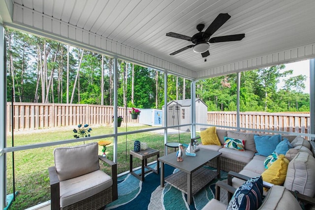 6134 High Top Ln, Aiken, SC 29801 - sunroom / solarium featuring outdoor lounge area, a ceiling fan, and view of scattered trees