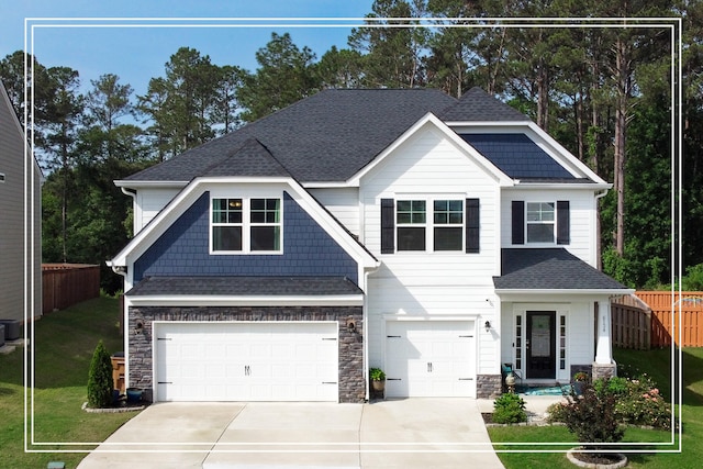 6134 High Top Ln, Aiken, SC 29801 - craftsman house featuring a garage, concrete driveway, stone siding, central AC unit, and roof with shingles