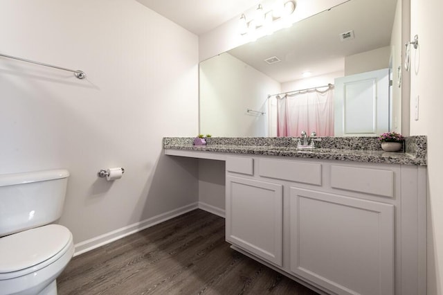 6134 High Top Ln, Aiken, SC 29801 - bathroom featuring wood finished floors, baseboards, toilet, a shower with shower curtain, and vanity