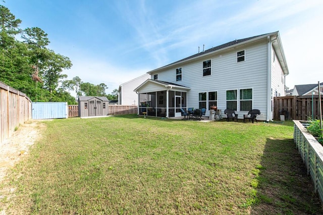 6134 High Top Ln, Aiken, SC 29801 - rear view of property featuring a sunroom, a storage unit, and an outdoor structure