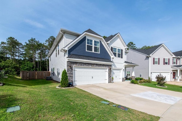 6134 High Top Ln, Aiken, SC 29801 - view of front of house featuring an attached garage, driveway, stone siding, and central AC