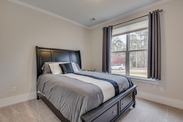 bedroom featuring crown molding and light carpet