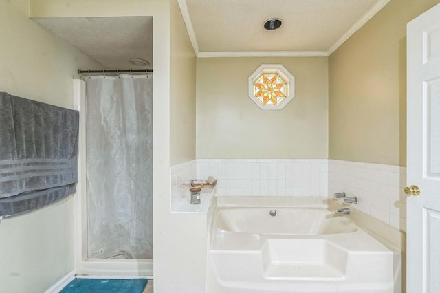 full bathroom with ornamental molding, a stall shower, and a bath