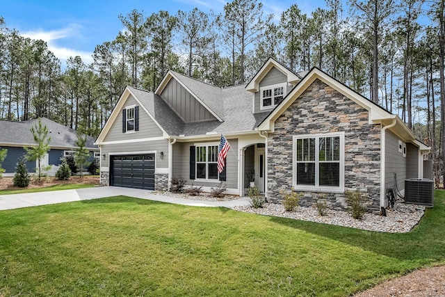 134 Twelve Oaks Dr, Mccormick, SC 29835 - craftsman-style house with driveway, stone siding, a front yard, a shingled roof, and central AC unit