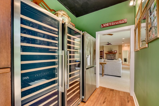 209 Apple Ln, Mccormick, SC 29835 - hallway featuring wood finished floors and wine cooler
