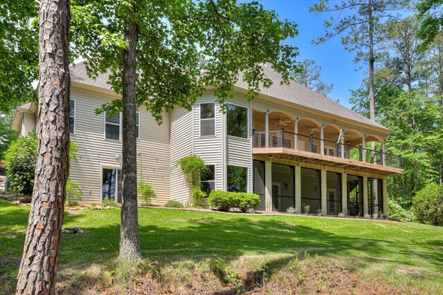 209 Apple Ln, Mccormick, SC 29835 - back of house featuring a ceiling fan, a lawn, roof with shingles, and a deck