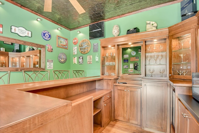209 Apple Ln, Mccormick, SC 29835 - indoor dry bar featuring an ornate ceiling, light wood finished floors, and crown molding