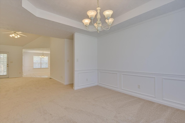 1008 Storey Mill Ct, Hephzibah, GA 30815 - empty room featuring a chandelier, light carpet, a ceiling fan, a wainscoted wall, and a raised ceiling