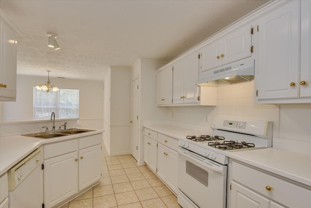1008 Storey Mill Ct, Hephzibah, GA 30815 - kitchen with white appliances, under cabinet range hood, white cabinets, and a chandelier