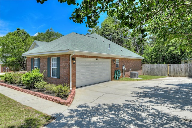 1008 Storey Mill Ct, Hephzibah, GA 30815 - view of property exterior with brick siding, concrete driveway, an attached garage, and a shingled roof