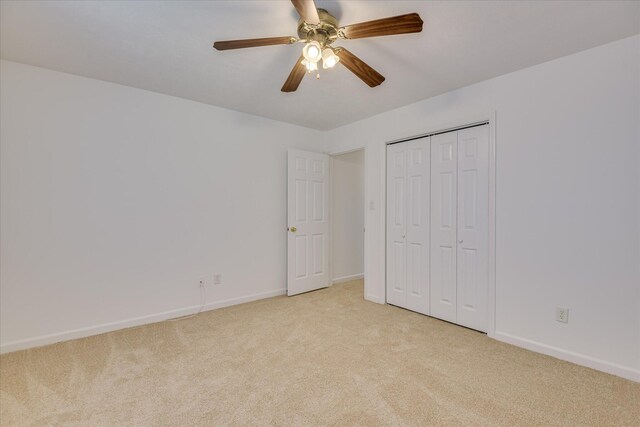 1008 Storey Mill Ct, Hephzibah, GA 30815 - unfurnished bedroom with light carpet, a closet, and ceiling fan