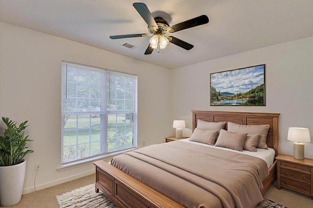 1008 Storey Mill Ct, Hephzibah, GA 30815 - bedroom with light carpet, multiple windows, and ceiling fan