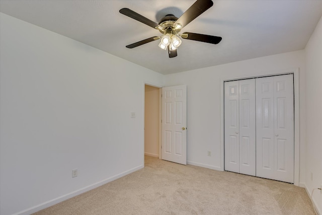 1008 Storey Mill Ct, Hephzibah, GA 30815 - unfurnished bedroom with light colored carpet, ceiling fan, and a closet