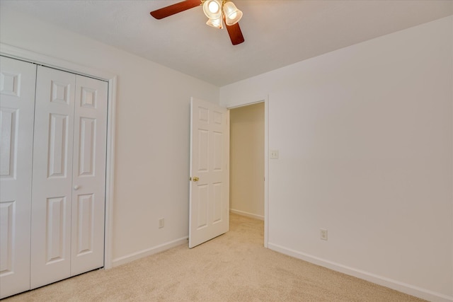 1008 Storey Mill Ct, Hephzibah, GA 30815 - unfurnished bedroom featuring light colored carpet, a closet, and a ceiling fan