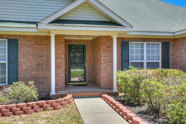 1008 Storey Mill Ct, Hephzibah, GA 30815 - doorway to property featuring brick siding and a porch