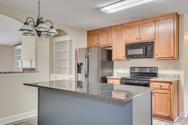 2030 Lake Forest Dr, Grovetown, GA 30813 - kitchen featuring black appliances, arched walkways, light wood-style flooring, and a chandelier