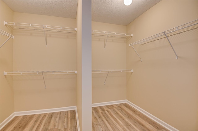 2030 Lake Forest Dr, Grovetown, GA 30813 - spacious closet with wood finished floors