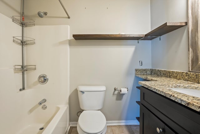 bathroom featuring toilet, vanity, shower / bathtub combination, and baseboards