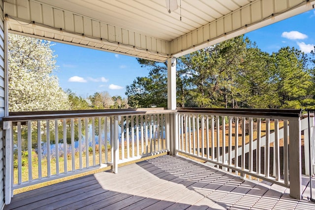 deck featuring a water view