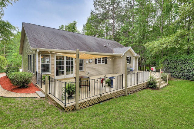138 Evergreen Ln, Mccormick, SC 29835 - rear view of house with a yard, a wooden deck, and roof with shingles