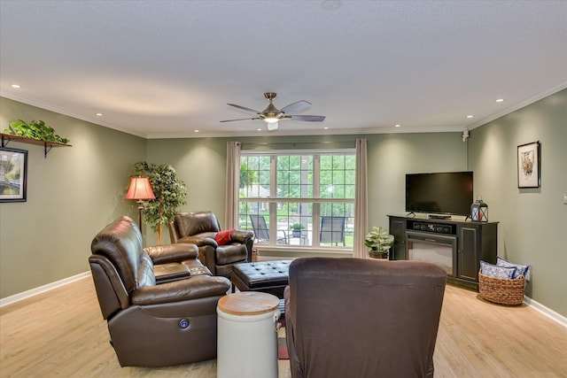 138 Evergreen Ln, Mccormick, SC 29835 - living area with light wood finished floors, baseboards, recessed lighting, a ceiling fan, and crown molding