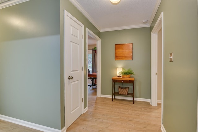 138 Evergreen Ln, Mccormick, SC 29835 - hall with light wood-style flooring, a desk, a textured ceiling, crown molding, and baseboards