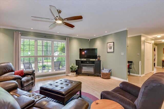 138 Evergreen Ln, Mccormick, SC 29835 - living room featuring a ceiling fan, light wood-style floors, recessed lighting, baseboards, and ornamental molding