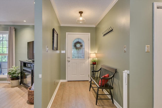 138 Evergreen Ln, Mccormick, SC 29835 - entryway with wood finished floors, ornamental molding, and baseboards