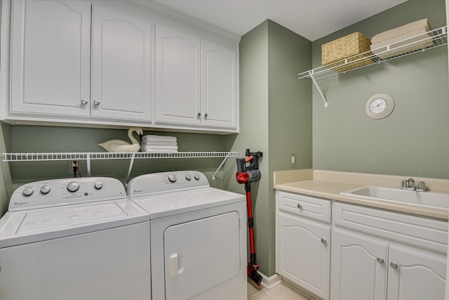 138 Evergreen Ln, Mccormick, SC 29835 - laundry area featuring washing machine and dryer and cabinet space