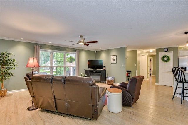138 Evergreen Ln, Mccormick, SC 29835 - living area featuring a ceiling fan, baseboards, recessed lighting, light wood finished floors, and crown molding