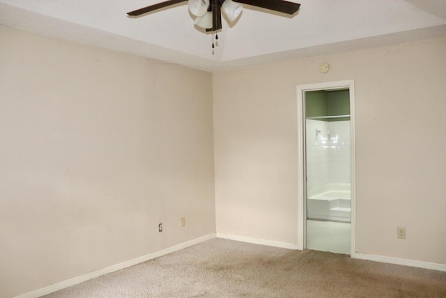 unfurnished bedroom with carpet floors, baseboards, and ceiling fan