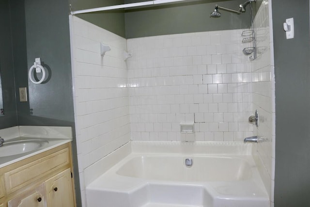 bathroom featuring vanity and bathing tub / shower combination