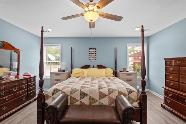 3604 Hillman Gay Rd, Dearing, GA 30808 - bedroom featuring light wood-style flooring, multiple windows, baseboards, ceiling fan, and recessed lighting