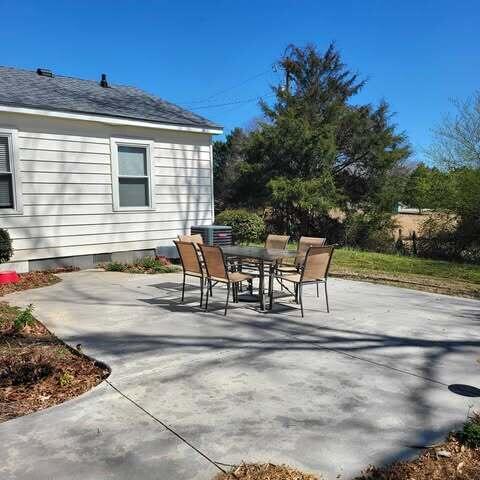 view of patio with central AC unit