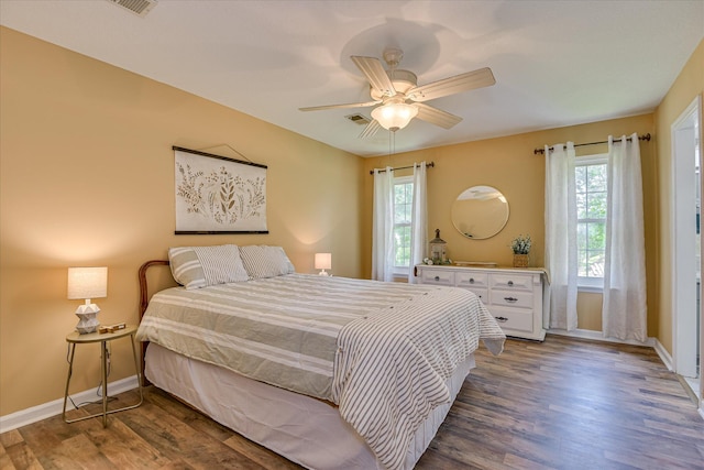 360 Stagecoach Way, Martinez, GA 30907 - bedroom with multiple windows, wood finished floors, and ceiling fan