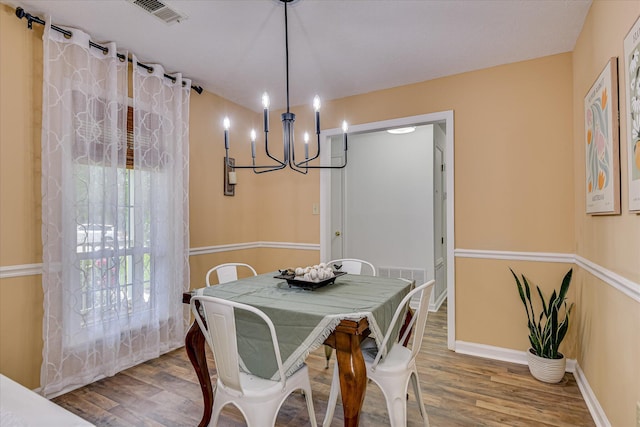 360 Stagecoach Way, Martinez, GA 30907 - dining space with a chandelier and wood finished floors