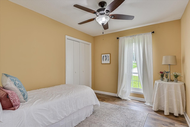 360 Stagecoach Way, Martinez, GA 30907 - bedroom with wood finished floors, a closet, and ceiling fan