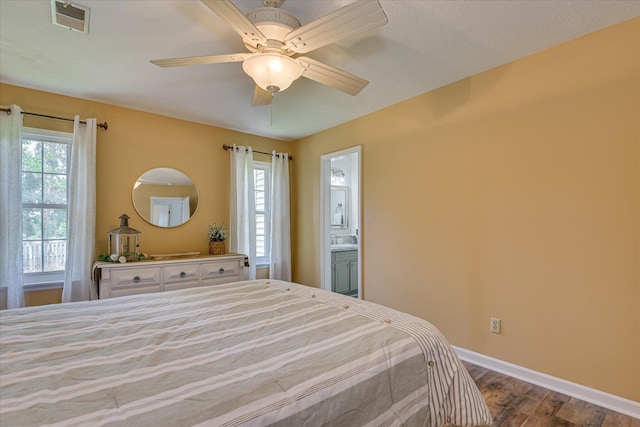 360 Stagecoach Way, Martinez, GA 30907 - bedroom with dark wood-style floors, a ceiling fan, and ensuite bath