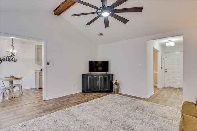 360 Stagecoach Way, Martinez, GA 30907 - living area featuring ceiling fan, wood finished floors, beamed ceiling, and high vaulted ceiling