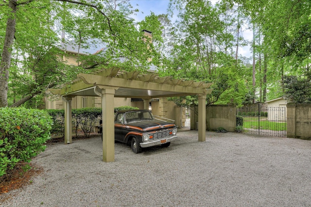 8 Tall Pine Ct, Augusta, GA 30909 - view of parking / parking lot with a carport, fence, driveway, and a gate