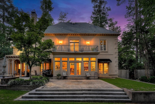 8 Tall Pine Ct, Augusta, GA 30909 - back of property with french doors, a balcony, a patio, stucco siding, and a chimney