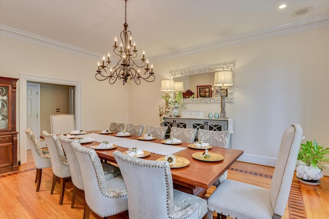 8 Tall Pine Ct, Augusta, GA 30909 - dining room featuring a chandelier, light wood-type flooring, crown molding, and baseboards