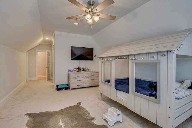 unfurnished bedroom featuring baseboards, visible vents, a ceiling fan, vaulted ceiling, and carpet floors