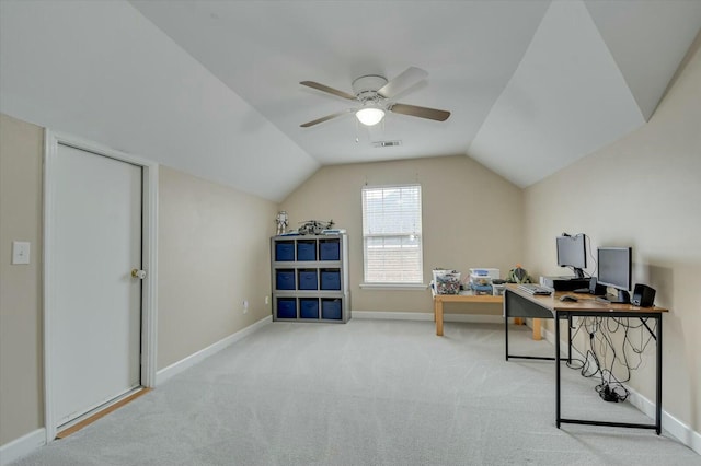 office space with light carpet, vaulted ceiling, and ceiling fan