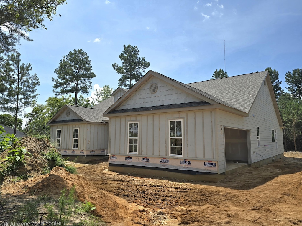 1403 Bellingham Dr, Beech Island, SC 29842 - view of side of property with board and batten siding, roof with shingles, and a garage