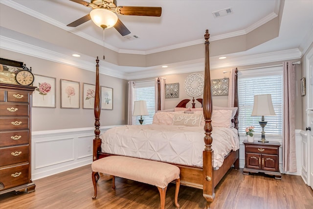 466 Cambridge Way, Martinez, GA 30907 - bedroom with light wood-style floors, a wainscoted wall, ceiling fan, a decorative wall, and crown molding
