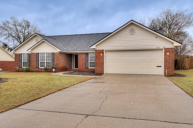 single story home with fence, driveway, a front lawn, a garage, and brick siding