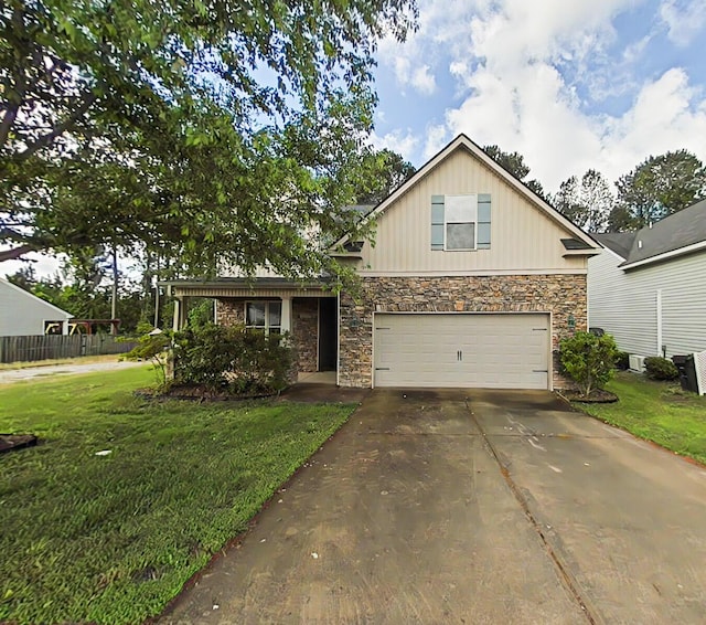 2461 Newbury Ave, Grovetown, GA 30813 - view of front of property featuring stone siding, concrete driveway, an attached garage, and central AC unit
