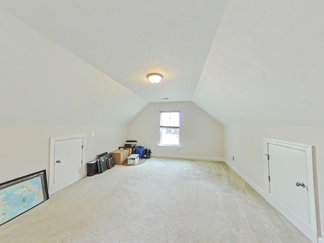 2461 Newbury Ave, Grovetown, GA 30813 - bonus room with light carpet, vaulted ceiling, and baseboards