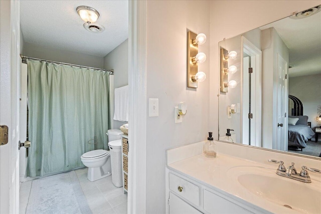 2920 Arrowhead Dr, Augusta, GA 30909 - full bath featuring toilet, vanity, ensuite bath, and tile patterned floors